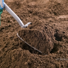 Digging Rolawn topsoil
